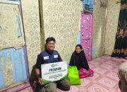 IZI Sultra Salurkan Paket Sembako bagi Masyarakat Pesisir Kendari Lewat Program Layanan Mulia Mustahik